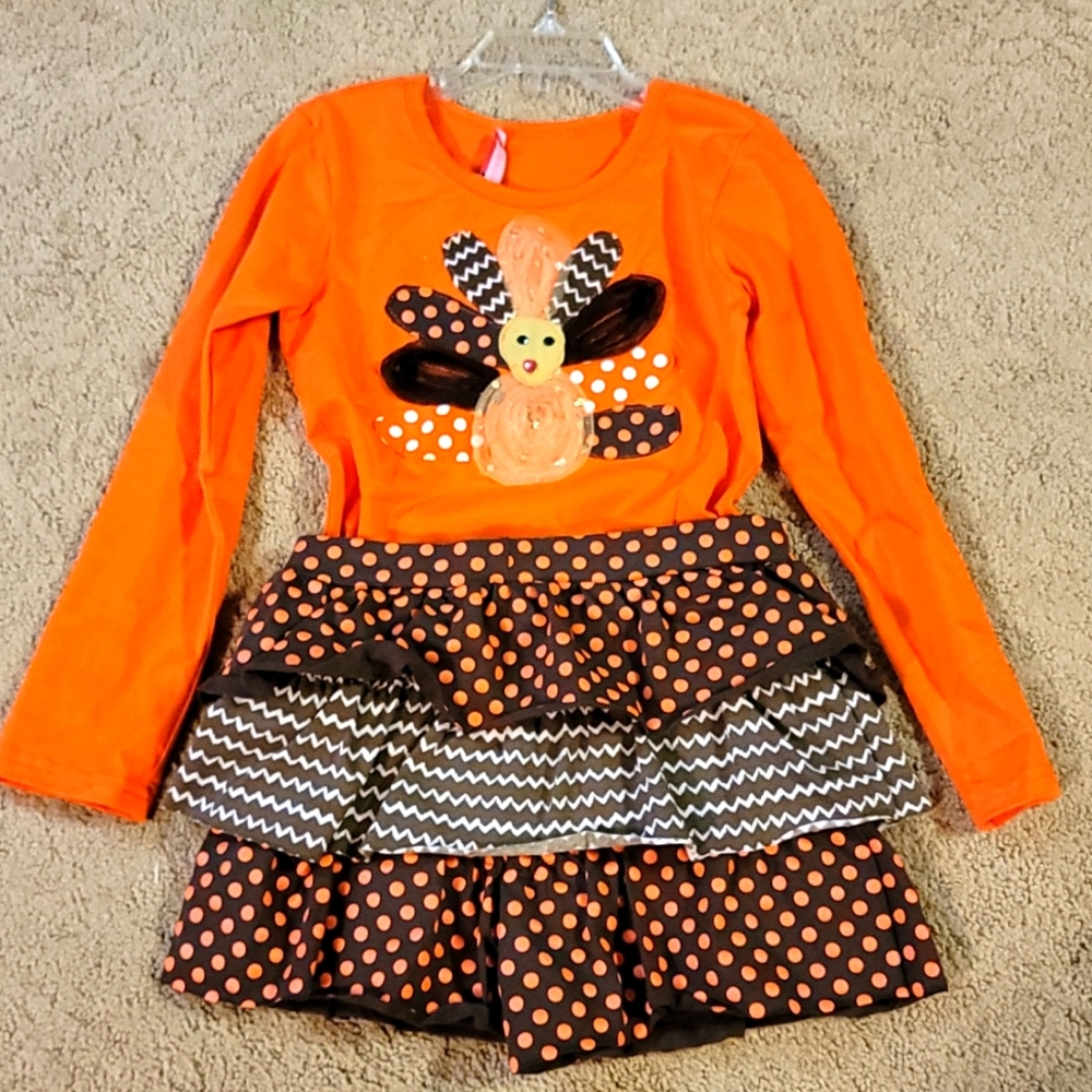Thanksgiving shirt and skort.